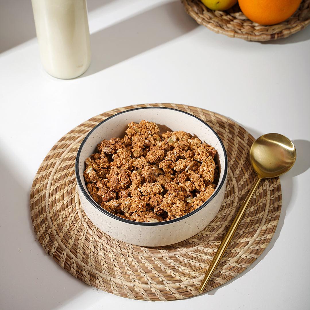 Ceramic bowl with metal spoon