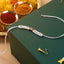 Rakhi - Faux Pearl with Green Stone