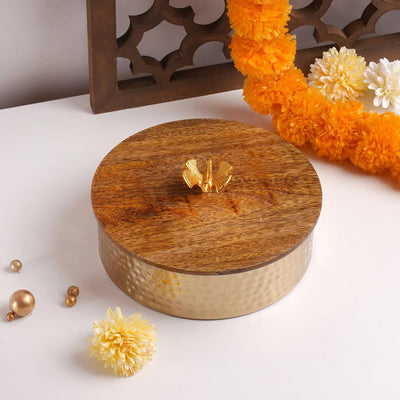 Round metal box with wooden lid