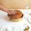 Round metal box with wooden lid